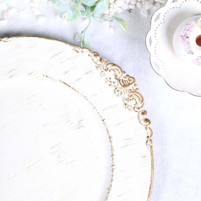 Elegant white plate with gold rim detail on a light background.