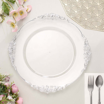 Elegant white plate with silver floral rim on a neutral background.