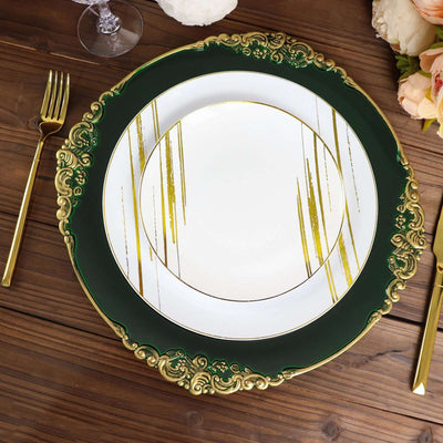 Elegant green and gold decorative plate on a wooden table setting.