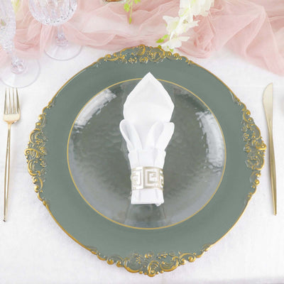 Elegant green plate with gold trim and white napkin on a stylish table setting.