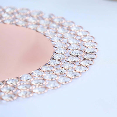 Rose gold mirror with crystal embellishments, elegantly designed for decor.