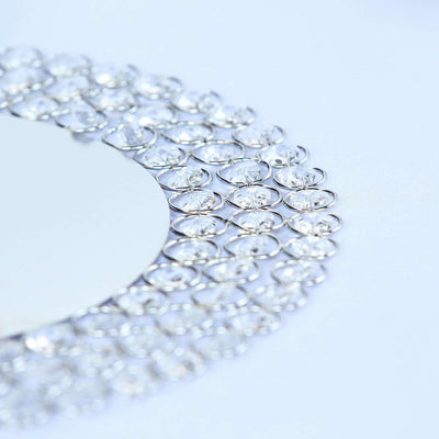 Elegant silver and crystal jewelry design with intricate detailing.