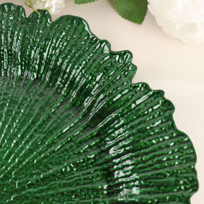 Green textured decorative plate with a scalloped edge.