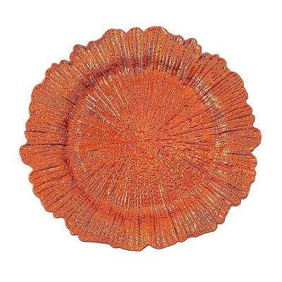 Orange textured decorative plate with a floral design.