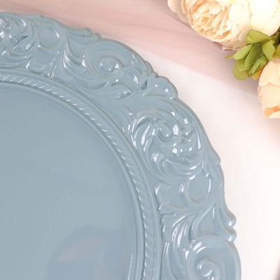 Elegant blue decorative plate with intricate embossed design.