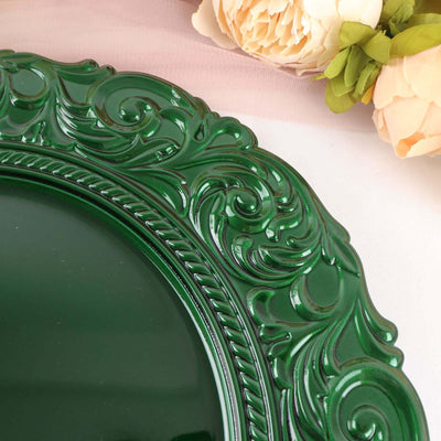 Green ornate decorative plate with intricate detailing and floral accents.