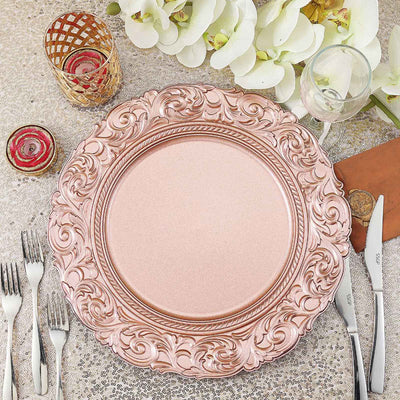 Elegant rose gold charger plate with ornate design, perfect for dining settings.