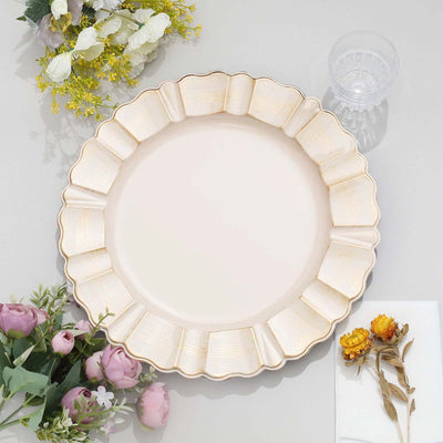 Decorative round plate with scalloped edges, surrounded by flowers and glass.