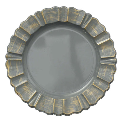 Gray decorative plate with a scalloped edge and gold accents