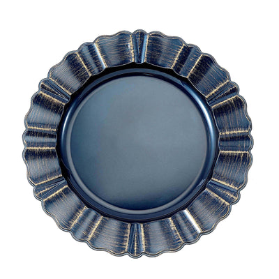Navy blue scalloped plate with a textured rim on a white background