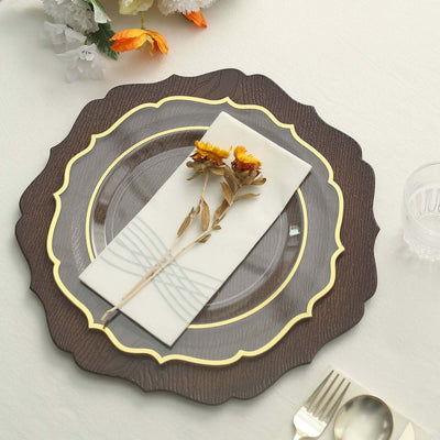 Elegant wooden charger plate with glass center and floral napkin, styled for dining.