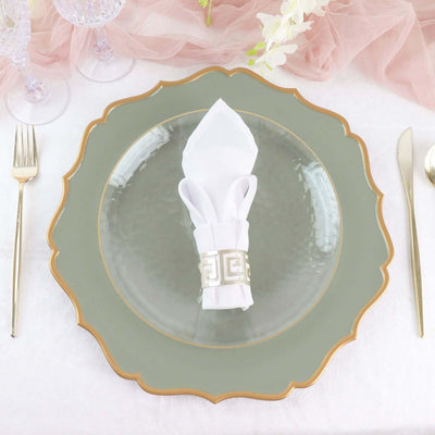 Elegant green plate with decorative napkin and gold accents on a stylish dining table.
