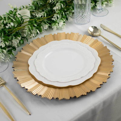 Elegant gold and white dinnerware set on a beautifully styled table.