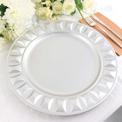 Elegant silver decorative charger plate for dining table settings.