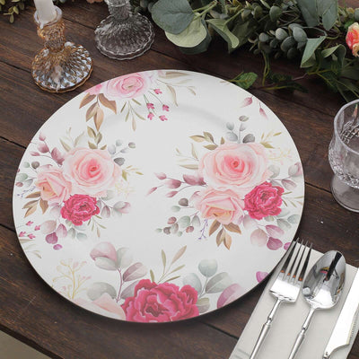 Floral round table mat with pink roses on a wooden table setting.