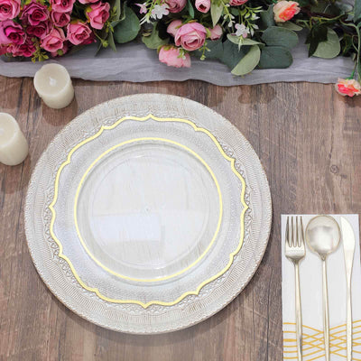 Elegant table setting with decorative plate, cutlery, and floral accents.