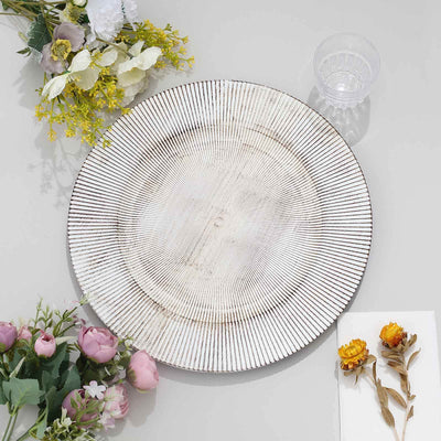 Textured round plate with a unique design, surrounded by decorative flowers.