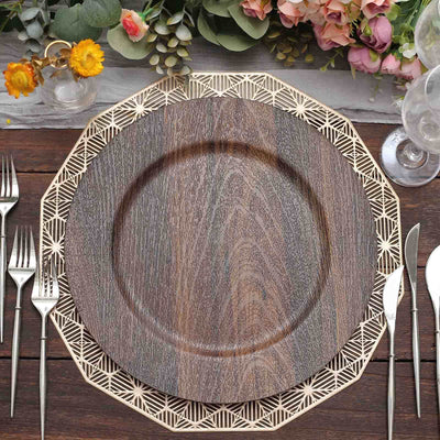Decorative wooden plate with intricate golden border on a wooden table setting.