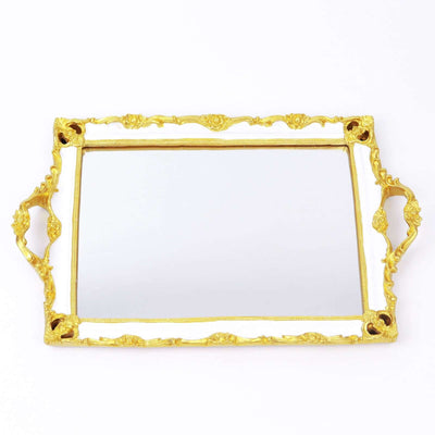 Gold ornate mirror tray with handles on a white background
