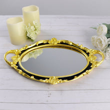 14 Inch x 10 Inch Resin Oval Vanity Serving Mirrored Tray with Handles in Metallic Black and Gold Color 