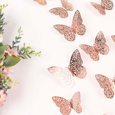 Rose gold decorative butterflies with floral arrangement