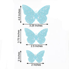 Wall decals - Three different sizes of turquoise paper butterflies on a white background