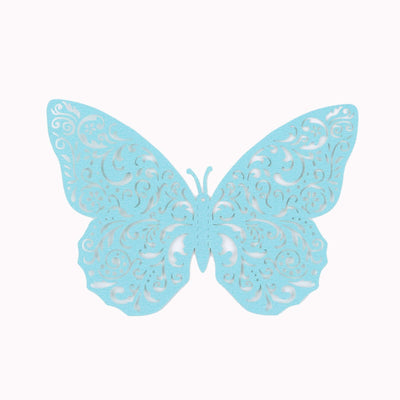 Blue decorative butterfly cutout with intricate designs