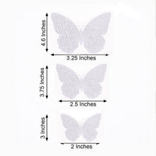 Wall decals of three different sizes of white paper butterflies