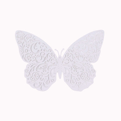 White intricate butterfly cutout with decorative patterns