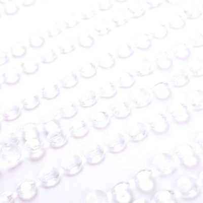Clear decorative beads arranged in a stylish pattern.