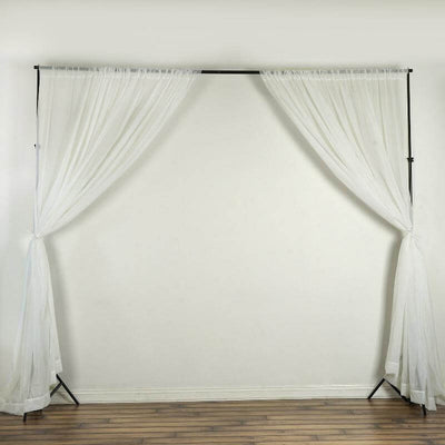 White sheer curtain backdrop on a black frame for events and photography.