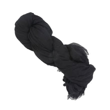 Cotton black flowy scarf on a white background