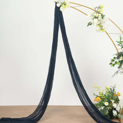 Navy chiffon drape elegantly hanging in a floral arrangement