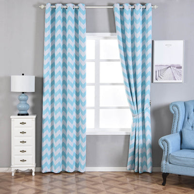 Chevron patterned blue curtains in a stylish living room setting.