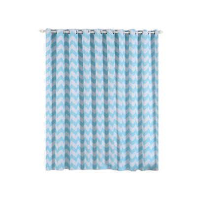 Blue chevron patterned shower curtain hanging on a rod