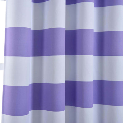 Purple striped curtains in a bright, airy setting.