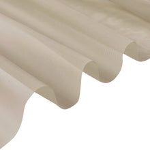 A close up of a piece of white sheer fabric on a white background