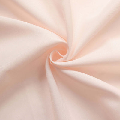 Light pink fabric texture with a soft, smooth finish.
