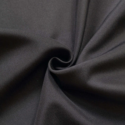 Black fabric with a smooth texture, ideal for various design applications.