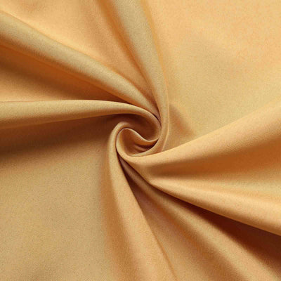 Soft golden fabric with smooth texture and elegant drape.