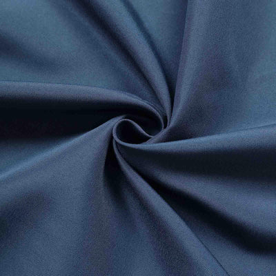 Navy blue fabric texture in a swirl pattern.