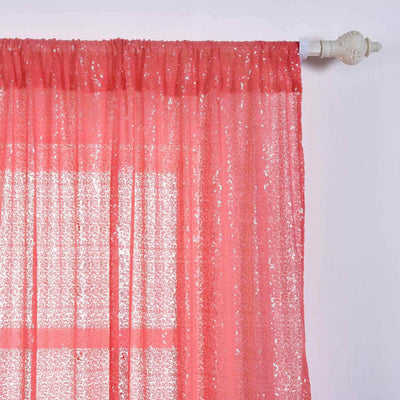 Coral sequin curtain panel hanging on a decorative rod.