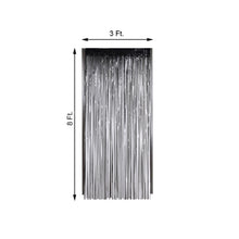 a black metallic foil tinsel curtain with measurements on a white background