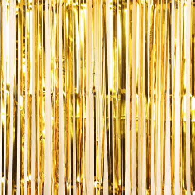 Shiny gold fringe backdrop for parties and events.