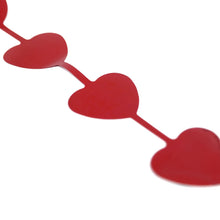 red metallic foil heart-shaped design