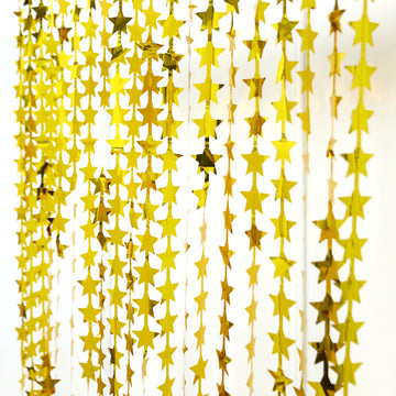Create a Stunning Atmosphere with the Metallic Gold Tinsel Streamer Backdrop