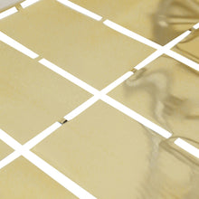 A close up of a gold tile with white lines#whtbkgd
