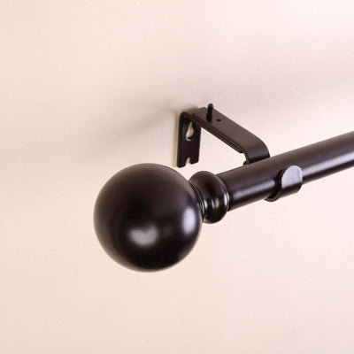 Black curtain rod with ball finial and bracket