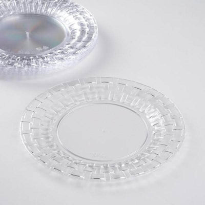 Clear decorative plate with a textured rim, studio shot.
