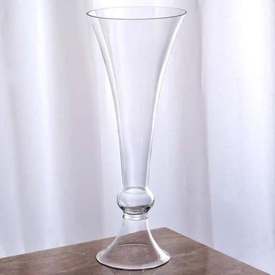 Clear tall glass vase with elegant design